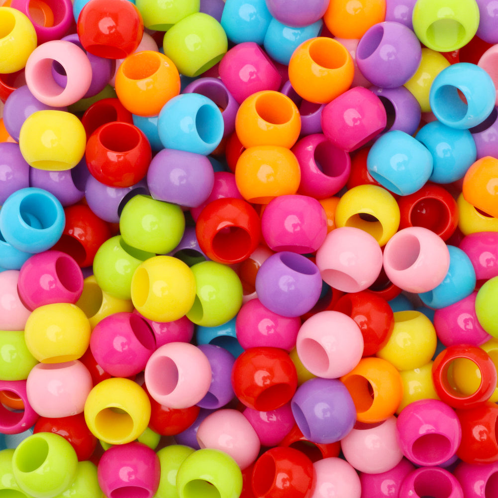 Top View of a Group of Large Hole Acrylic Beads Together in a Flat Lay