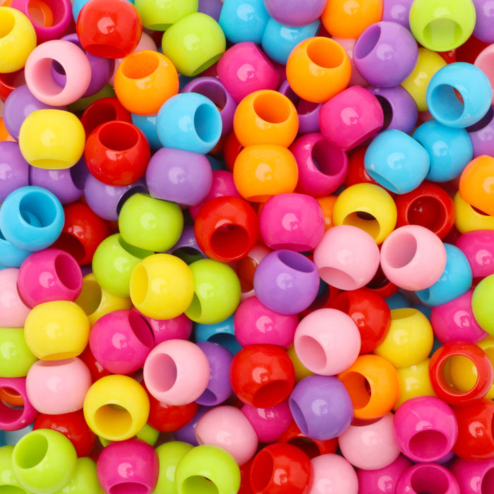 Top View of a Group of Large Hole Acrylic Beads Together in a Flat Lay