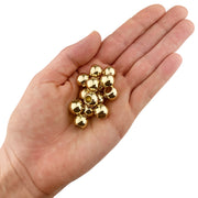Acrylic Large Hole Beads for Crafts 10mm x 12mm Acrylic Barrel Beads with 5.7mm Large Hole, Shiny Gold shown in a hand on a white background